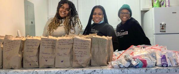 Ms. Erica Bowles and friends feeding their community